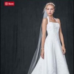 Brand new wedding dress never worn.